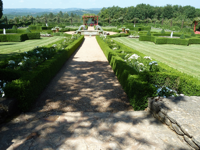The White Garden, with its central path and water feature seems to float into the distant view. 