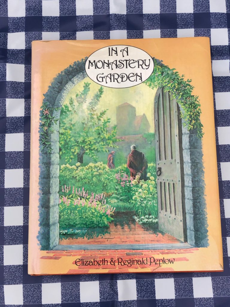 book cover in a monastery garden