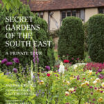 Book cover for Secret Gardens of the South East by Barbara Segall showing cottage garden with half-timbered house in the background