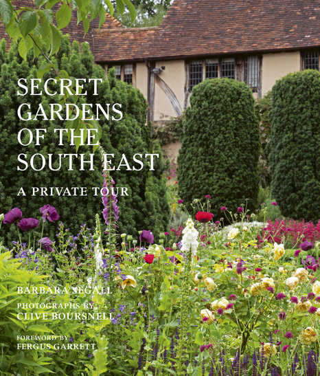 Book cover for Secret Gardens of the South East by Barbara Segall showing cottage garden with half-timbered house in the background
